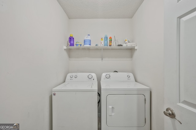 3524 Forest Downs Cv, Decatur, GA 30034 - laundry room with washer and clothes dryer and a textured ceiling