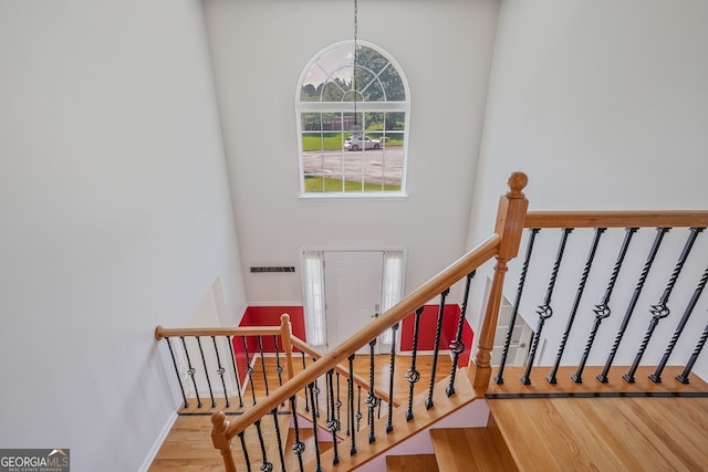 3524 Forest Downs Cv, Decatur, GA 30034 - stairway featuring wood finished floors and a towering ceiling