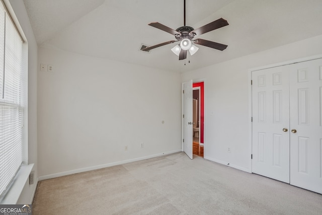3524 Forest Downs Cv, Decatur, GA 30034 - unfurnished bedroom with light carpet, baseboards, a closet, and a ceiling fan