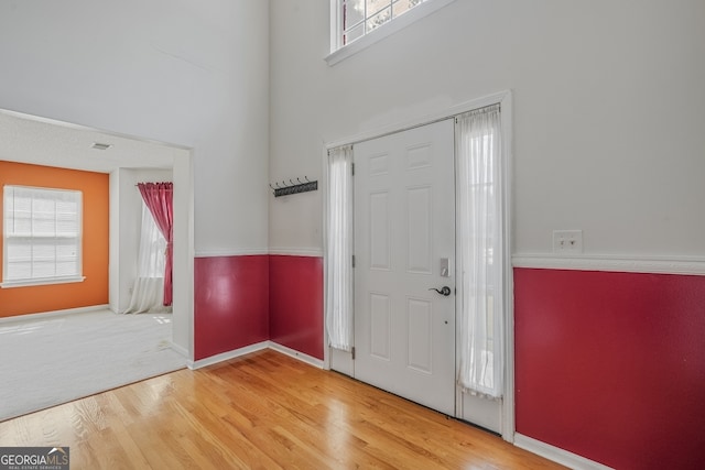 3524 Forest Downs Cv, Decatur, GA 30034 - foyer featuring plenty of natural light, wood finished floors, a high ceiling, and baseboards