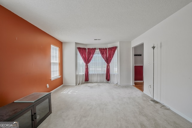 3524 Forest Downs Cv, Decatur, GA 30034 - carpeted empty room featuring a textured ceiling and baseboards