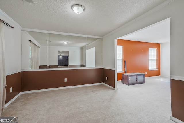 3524 Forest Downs Cv, Decatur, GA 30034 - carpeted empty room with crown molding, a textured ceiling, and baseboards