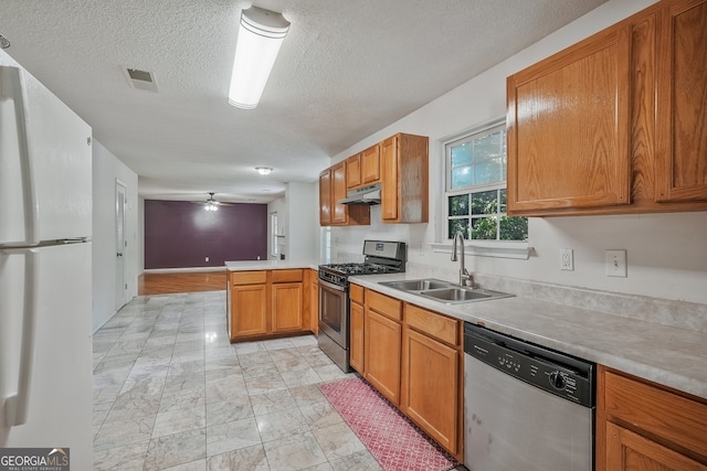 3524 Forest Downs Cv, Decatur, GA 30034 - kitchen with stainless steel appliances, under cabinet range hood, light marble finish flooring, a sink, and a peninsula