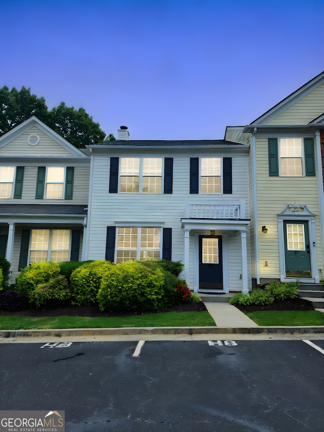 10900 Wittenridge Dr Unit H8, Alpharetta, GA 30022 - townhome / multi-family property with uncovered parking and a chimney