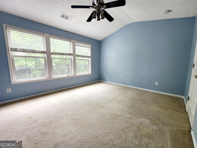10900 Wittenridge Dr Unit H8, Alpharetta, GA 30022 - carpeted spare room with lofted ceiling, a textured ceiling, a ceiling fan, and baseboards