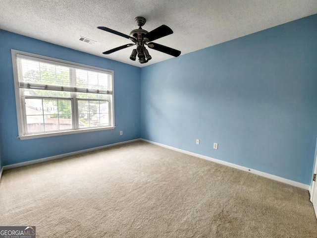 10900 Wittenridge Dr Unit H8, Alpharetta, GA 30022 - carpeted empty room with a textured ceiling, baseboards, and a ceiling fan