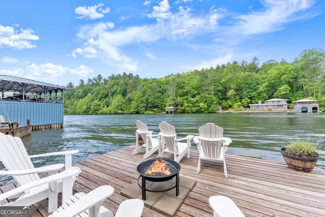 1431 Tame Turkey Rd, Lakemont, GA 30552 - dock area with an outdoor fire pit, a water view, and a view of trees