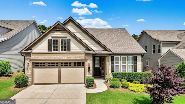 123 Mulberry Ct, Peachtree City, GA 30269 - craftsman inspired home featuring concrete driveway, stone siding, a garage, and roof with shingles