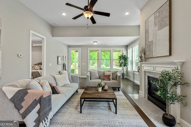 123 Mulberry Ct, Peachtree City, GA 30269 - living room with ceiling fan, a high end fireplace, baseboards, and recessed lighting