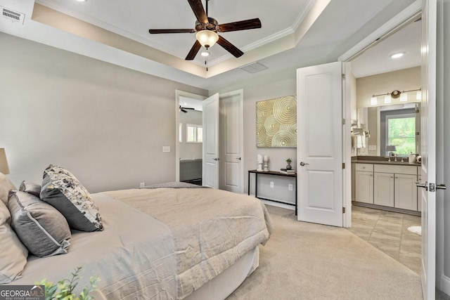 123 Mulberry Ct, Peachtree City, GA 30269 - bedroom featuring a raised ceiling, ornamental molding, connected bathroom, light carpet, and ceiling fan