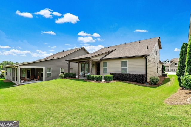 123 Mulberry Ct, Peachtree City, GA 30269 - back of house featuring a patio area, a yard, and a shingled roof