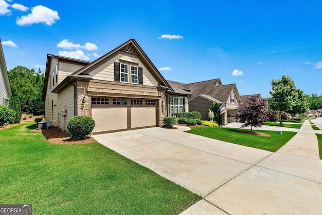 123 Mulberry Ct, Peachtree City, GA 30269 - view of front of property with driveway, a front lawn, an attached garage, and stone siding