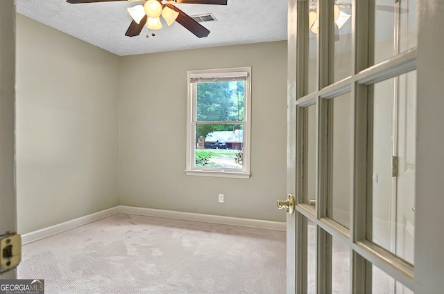299 Fieldview Dr, Auburn, GA 30011 - carpeted spare room featuring baseboards, ceiling fan, and a textured ceiling