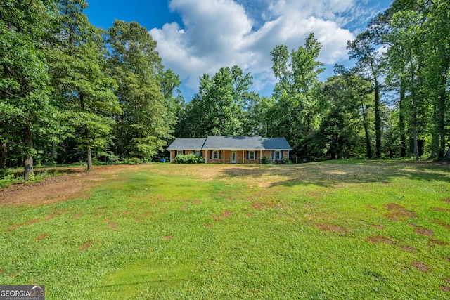 299 Fieldview Dr, Auburn, GA 30011 - view of grassy yard featuring a forest view