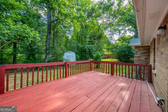 299 Fieldview Dr, Auburn, GA 30011 - wooden terrace featuring a lawn and view of scattered trees