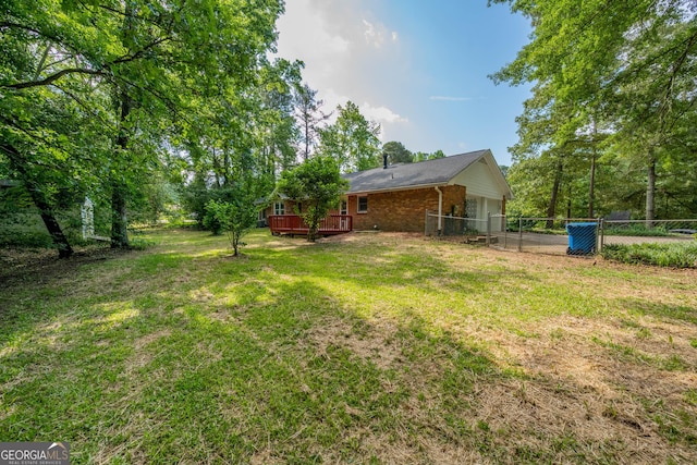 299 Fieldview Dr, Auburn, GA 30011 - view of yard featuring a deck and a garage