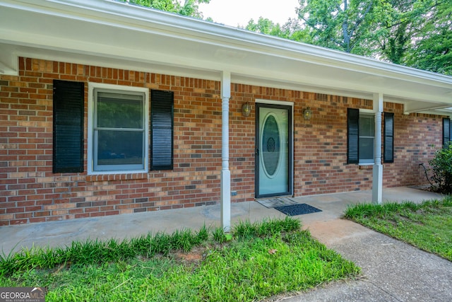 299 Fieldview Dr, Auburn, GA 30011 - view of exterior entry featuring a porch and brick siding