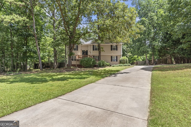 230 Hannah Dr, Colbert, GA 30628 - view of front of property with concrete driveway and view of scattered trees
