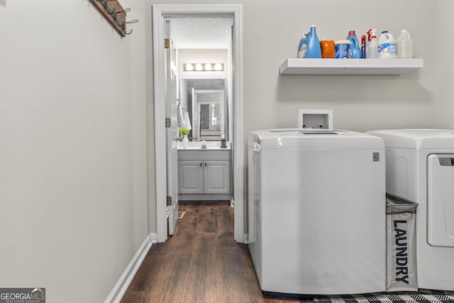 230 Hannah Dr, Colbert, GA 30628 - laundry area featuring washer and clothes dryer and dark wood-style flooring