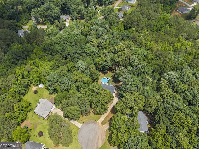 230 Hannah Dr, Colbert, GA 30628 - aerial overview of property's location with a heavily wooded area