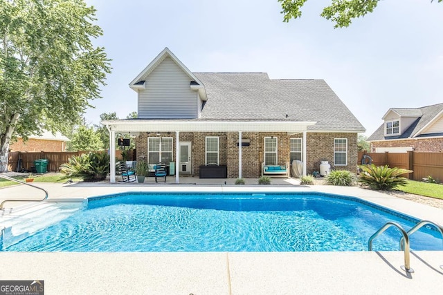 215 Wilsons Creek Bnd, Bonaire, GA 31005 - view of pool featuring a patio and an outdoor hangout area