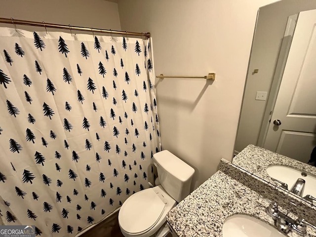 134 Red Oak Dr, Barnesville, GA 30204 - full bathroom with vanity, toilet, and a shower with curtain