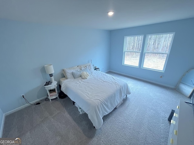 134 Red Oak Dr, Barnesville, GA 30204 - carpeted bedroom featuring baseboards