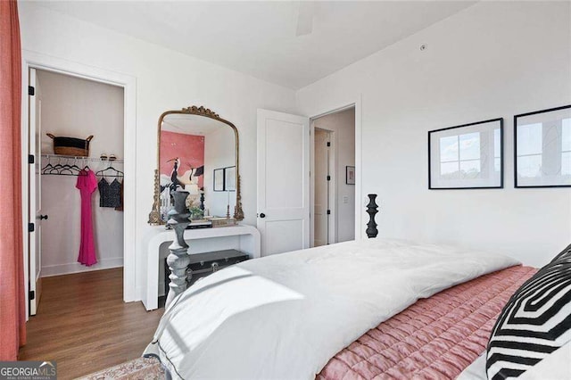 989 Bibbs Cir NW Unit 25, Atlanta, GA 30318 - bedroom with wood finished floors and baseboards