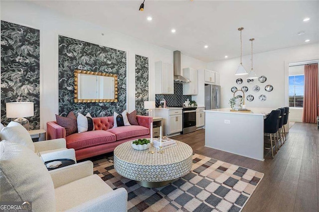 989 Bibbs Cir NW Unit 25, Atlanta, GA 30318 - living area with dark wood finished floors and recessed lighting