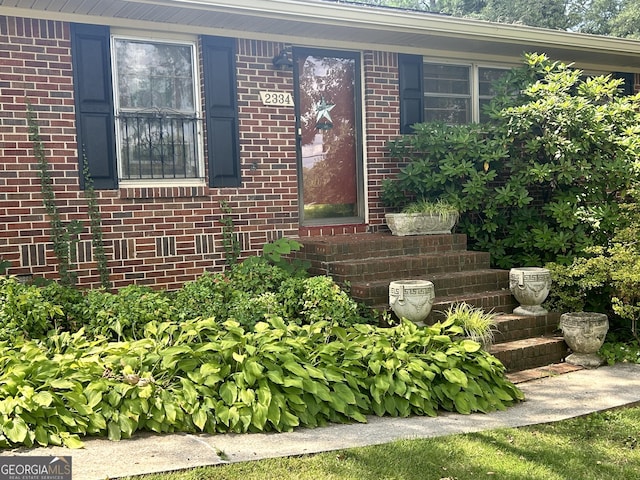 2334 Connally Dr, East Point, GA 30344 - view of exterior entry featuring brick siding