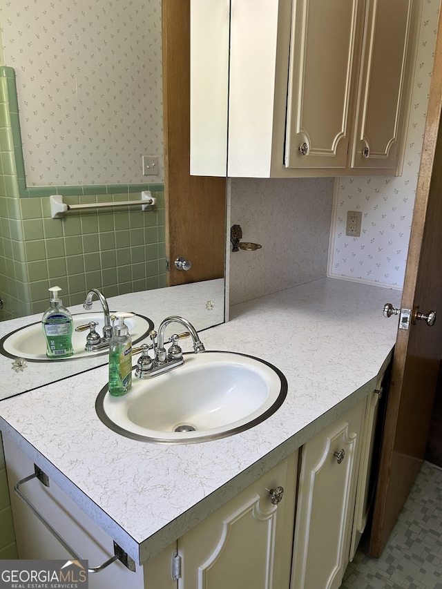 2334 Connally Dr, East Point, GA 30344 - bathroom featuring wallpapered walls and vanity