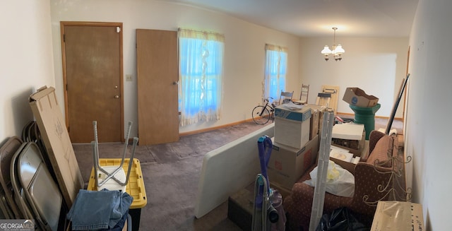 2334 Connally Dr, East Point, GA 30344 - dining room with carpet floors and a chandelier