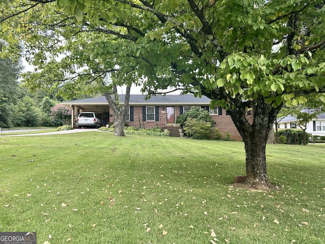 2334 Connally Dr, East Point, GA 30344 - ranch-style home with brick siding, an attached carport, a front lawn, and driveway