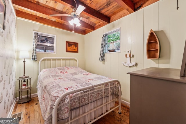 3644 Bert Dr, Gainesville, GA 30506 - bedroom featuring a wooden ceiling with exposed beams, wood-type flooring, and a ceiling fan