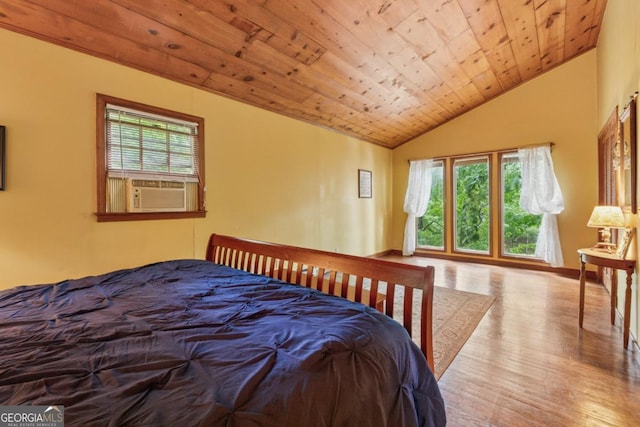 3644 Bert Dr, Gainesville, GA 30506 - bedroom with cooling unit, vaulted ceiling, wood finished floors, and wooden ceiling