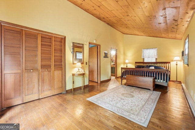 3644 Bert Dr, Gainesville, GA 30506 - bedroom featuring lofted ceiling, wood finished floors, wood ceiling, and a baseboard heating unit