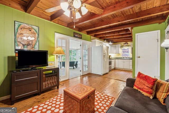 3644 Bert Dr, Gainesville, GA 30506 - living room with a wooden ceiling with exposed beams, light wood finished floors, healthy amount of natural light, and a ceiling fan