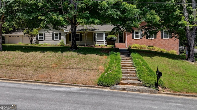 5 Hillcroft Dr NE, Rome, GA 30161 - view of front facade with brick siding, a front yard, and a garage