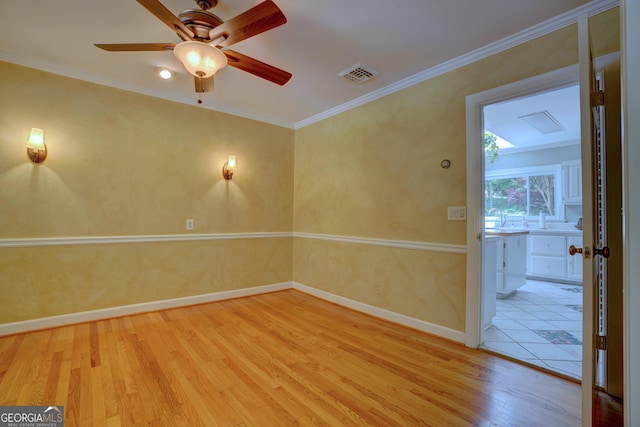5 Hillcroft Dr NE, Rome, GA 30161 - empty room with wood finished floors, a ceiling fan, baseboards, and ornamental molding