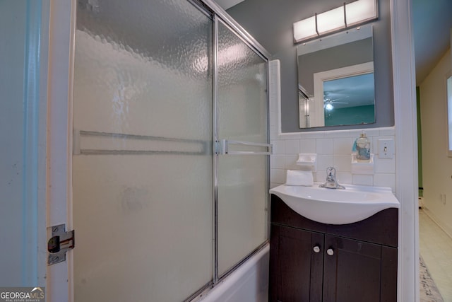 5 Hillcroft Dr NE, Rome, GA 30161 - bathroom featuring vanity, combined bath / shower with glass door, tile walls, and wainscoting