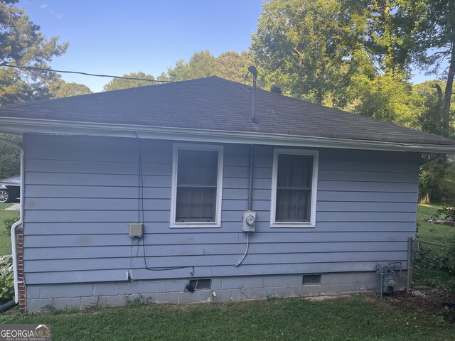2530 Old Colony Rd, East Point, GA 30344 - view of side of home with crawl space and a shingled roof