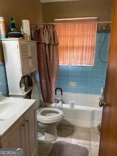 2530 Old Colony Rd, East Point, GA 30344 - full bath with toilet, vanity, shower / bathtub combination with curtain, and tile patterned flooring