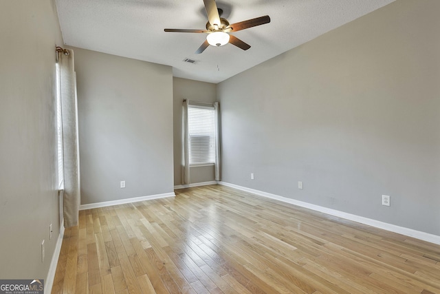 508 Las Brasis Ct, Peachtree City, GA 30269 - empty room featuring ceiling fan, light wood finished floors, baseboards, and a textured ceiling