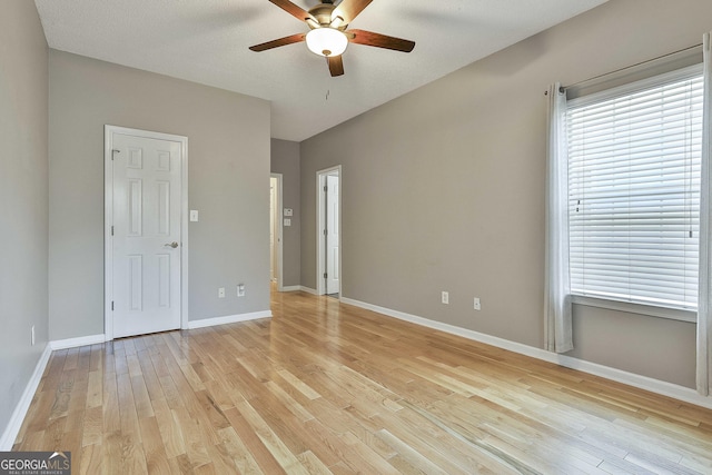 508 Las Brasis Ct, Peachtree City, GA 30269 - empty room with a ceiling fan, light wood-style floors, and baseboards