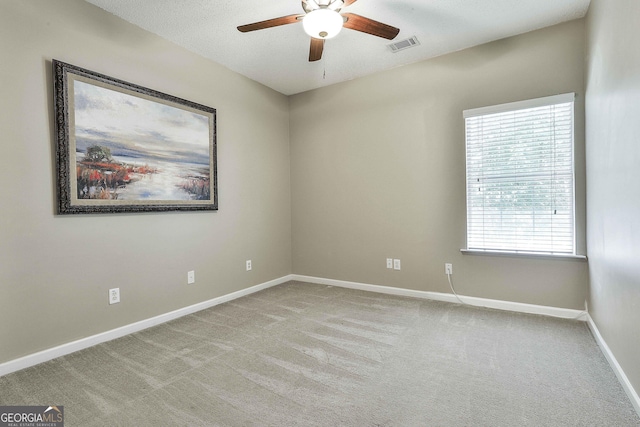 508 Las Brasis Ct, Peachtree City, GA 30269 - spare room featuring a ceiling fan, baseboards, and carpet flooring