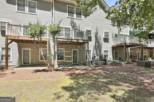 508 Las Brasis Ct, Peachtree City, GA 30269 - back of property with a deck and cooling unit