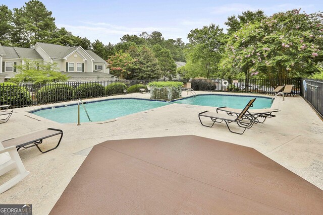 508 Las Brasis Ct, Peachtree City, GA 30269 - community pool featuring a patio