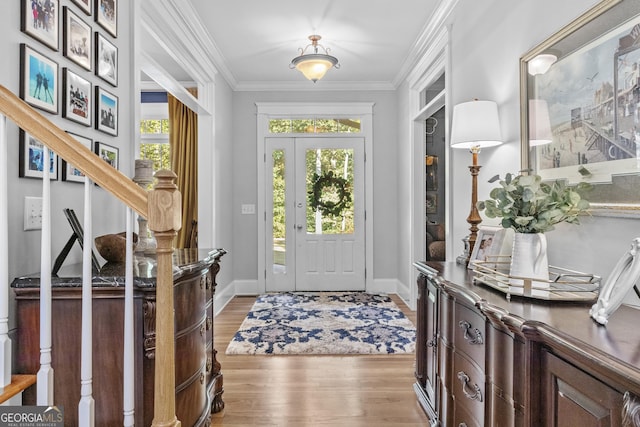 155 Bear Paw Ct, Clarkesville, GA 30523 - entryway with light wood finished floors, ornamental molding, and baseboards