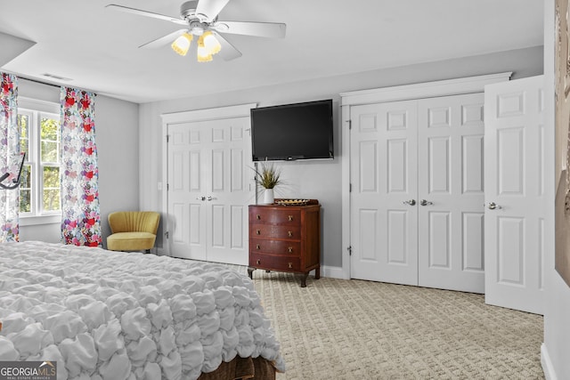 155 Bear Paw Ct, Clarkesville, GA 30523 - carpeted bedroom featuring multiple closets and ceiling fan