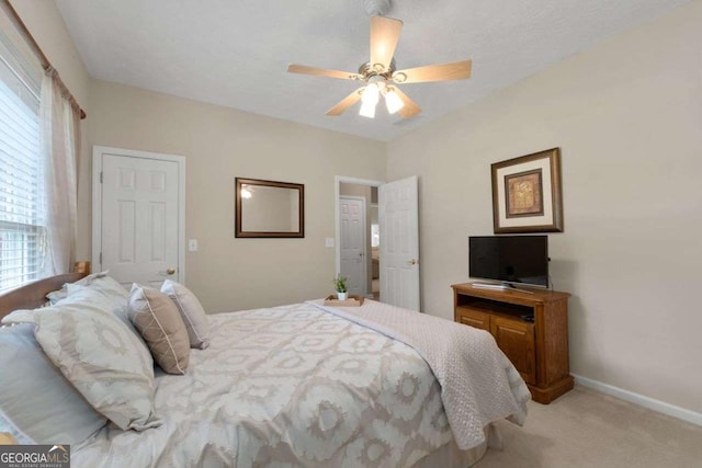 3027 Biltmore Woods Dr, Buford, GA 30519 - bedroom featuring light colored carpet, ceiling fan, and baseboards